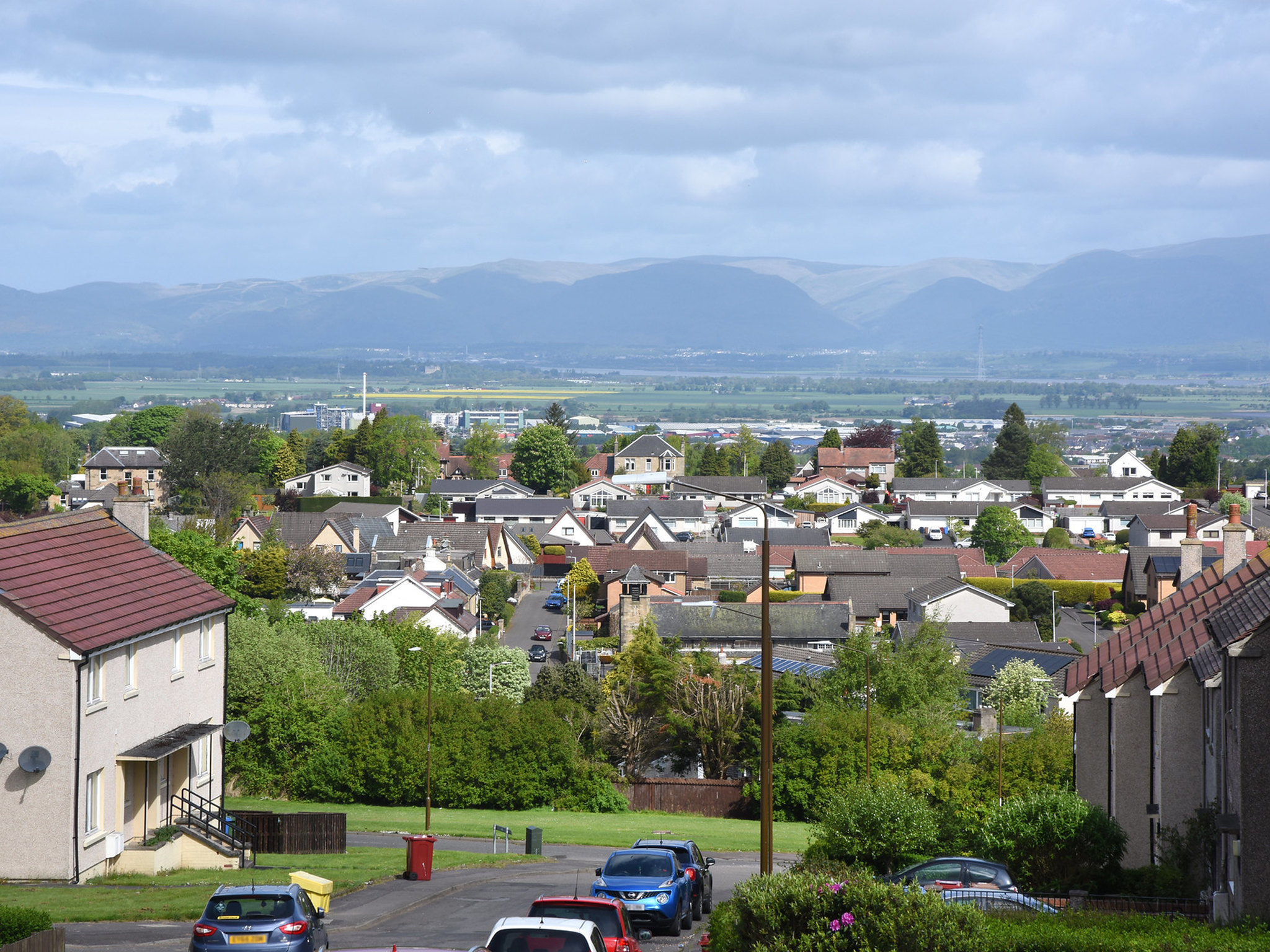 Photo of rooftops in Falkirk with the hills in the distance
