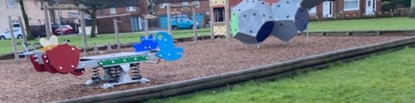 Image of Hillview park with the playpark on the left and the bridge over to Marion View on the left.
