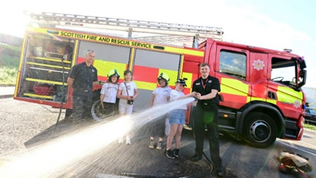 📷 The fire brigade lent a hand – and a hose – to help water plants.